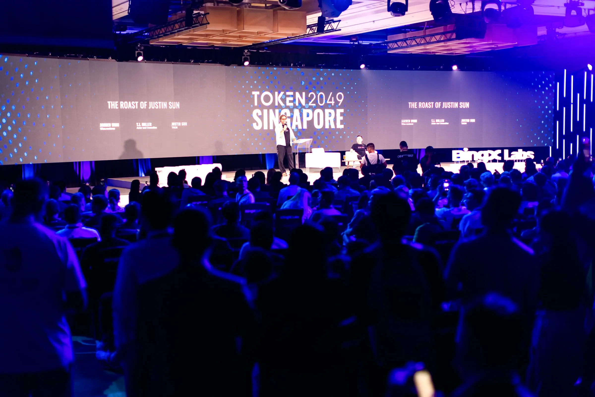 The Roast of Justin Sun at Token2049 Singapore 2025 — the room seen from the stage, every seat taken and the aisles full
